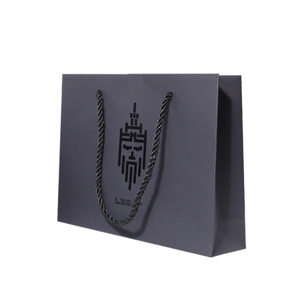 comprar Anunció bolsas de papel negras impresas de los tamaños con el punto Logo Twisted Handles ULTRAVIOLETA online manufacture