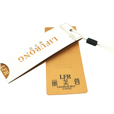 comprar Las etiquetas de papel del oscilación de la marca de la ropa de lujo de encargo graban en relieve la hoja de oro que sella el logotipo online manufacture