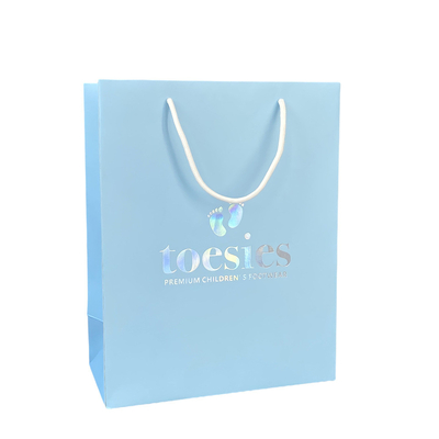 Un buen precio. De papel azul de lujo impresa bolsa la ropa que empaqueta con el logotipo del holograma en línea