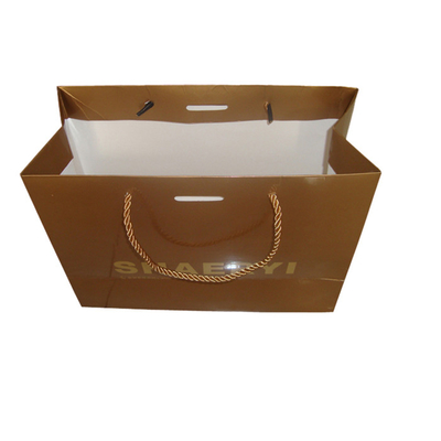 Un buen precio. Bolsos de compras baratos de encargo del papel de Brown con la venta al por mayor de la impresión de las ilustraciones en línea